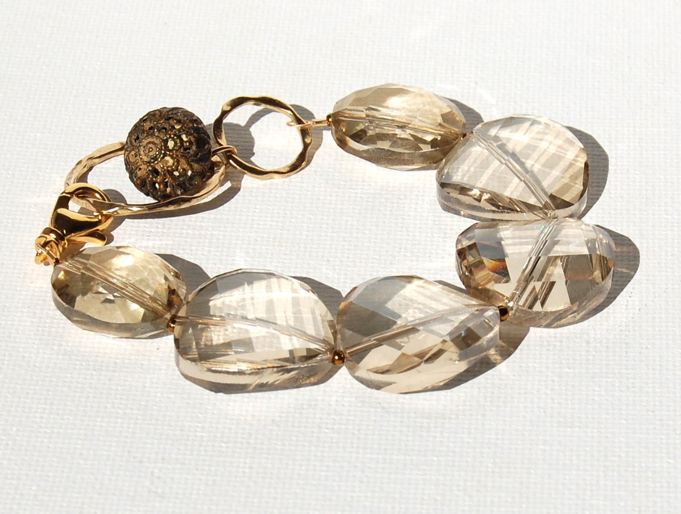 Magnificent Crystal Bracelet. Large Faceted Champagne Crystals and Antique Button