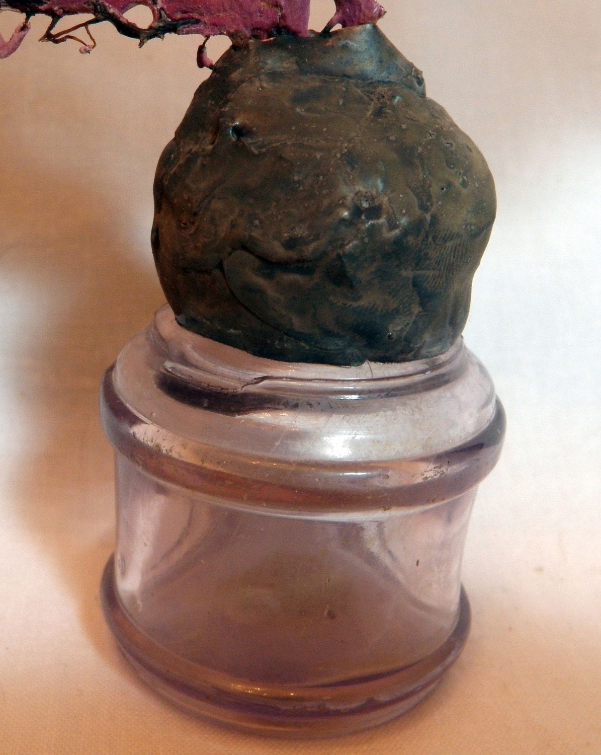 Vintage ink well bottle with soldered sea fan
