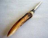 Knife sharpening steel with bone handle. Sharpener is useful in kitchen for men and women. Vintage themed gift basket idea.