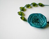 Moss green asymmetric beaded glass necklace with turquoise wood clay flower- Made to order