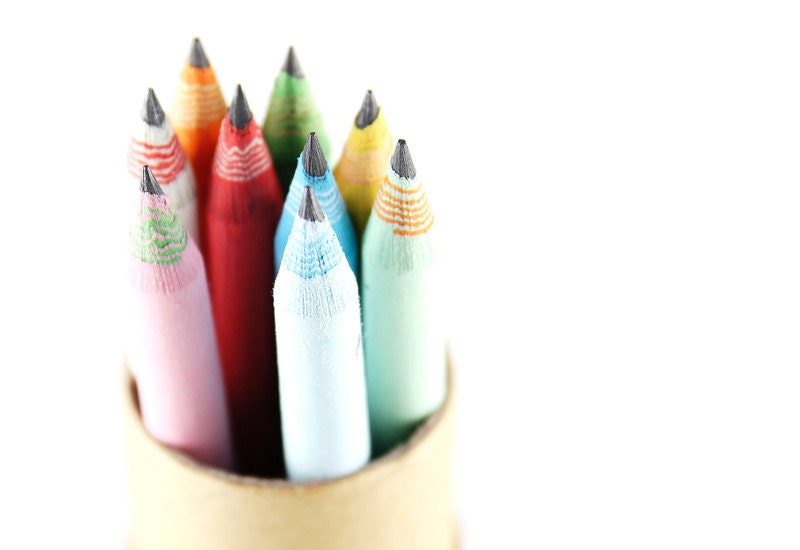9 Piece Colorful Eco-Friendly Recycled Paper Pencils in black kraft tube - made from 100% recycled paper - great as gifts and party favors