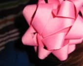 A perfect present pink "gift bow" hair clip. The perfect hair accessory for the birthday girl