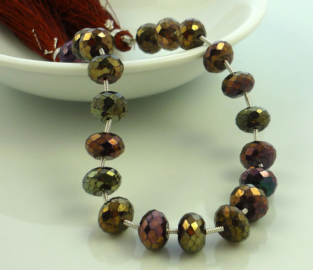 Metallic chocolate spinel large rondelles 8-8.5mm 1/2 strand