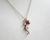 Sweet Sea Horse necklace--Antique bronze sea horse charm with faceted ruby bead