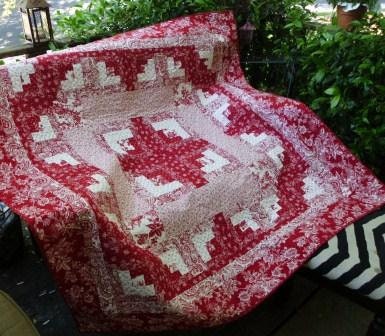 Red and white log cabin quilt