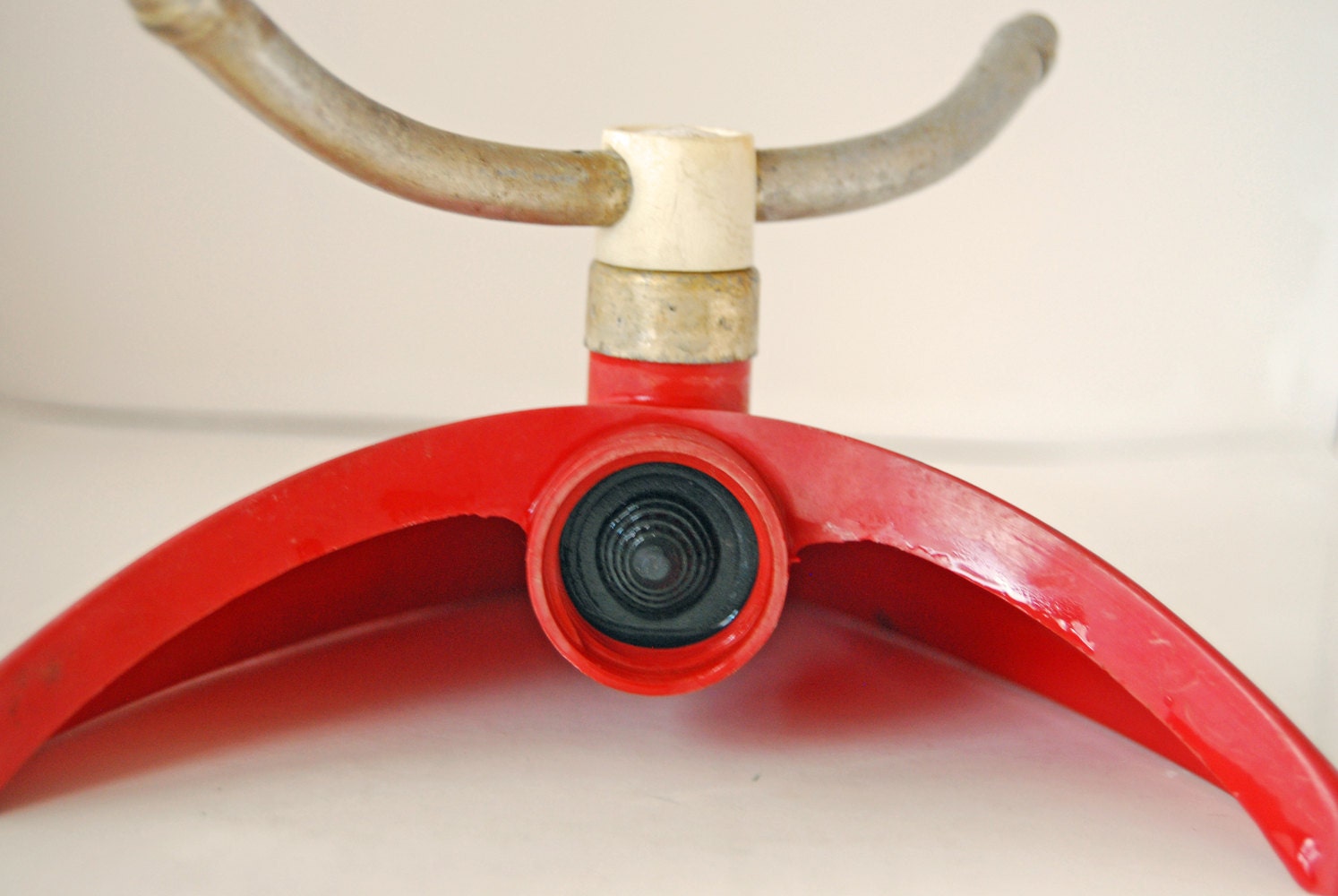Retro Red Plastic Sprinkler