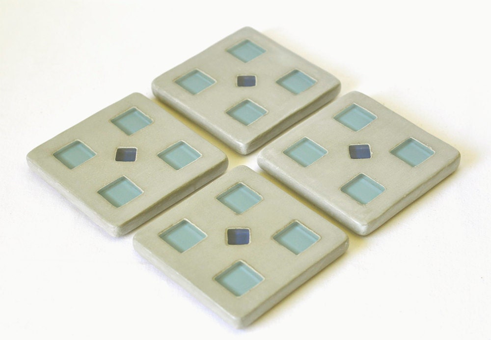 Concrete Coasters with dark blue and light blue tile inlay