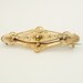 Edwardian rose gold on brass pretty bar brooch