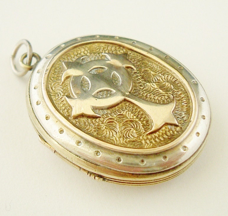 RESERVED for Nancy Fabulous antique victorian locket with celtic cross , bi-color embossed.