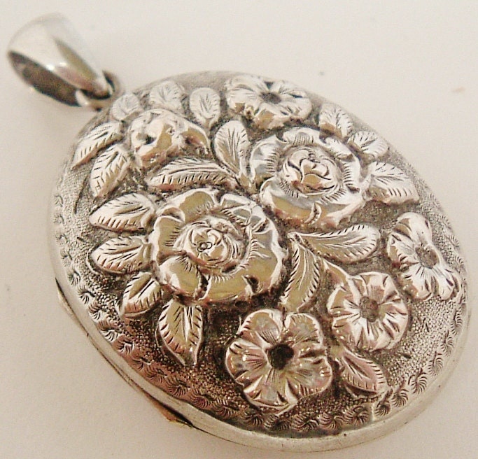 Antique French art nouveau silver plate locket embossed with roses