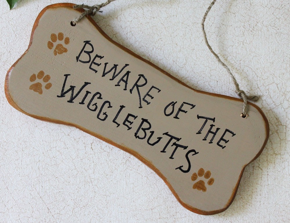 Sign Beware of the Wigglebutts