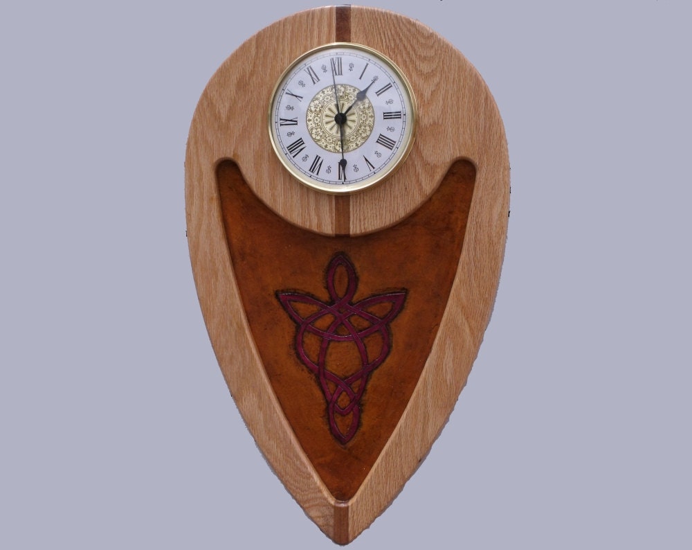Red oak large wall clock with carved leather insert