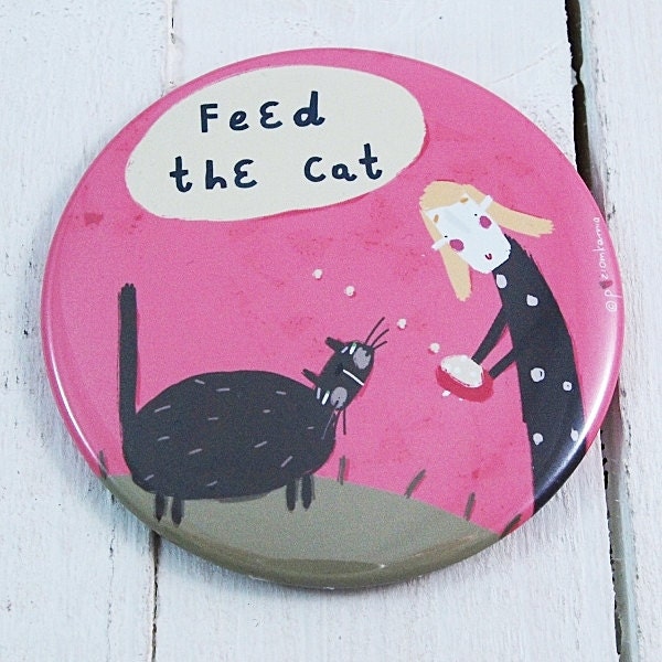 A pink lovely magnet with a girl Mi and her cat - Feed the cat