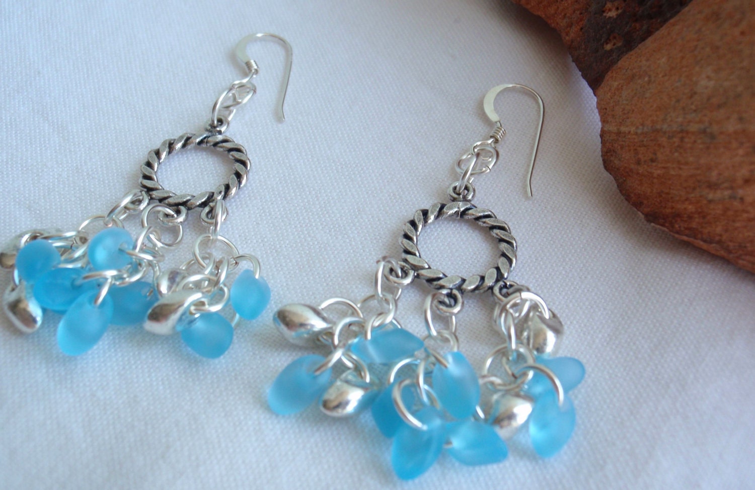 Twisted Rhodium Plated Silver Earrings with Turqoise Magatama Beads