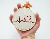 Hand embroidery - Burgundy heart with palpitation - Cute cross stitch in wooden hoop