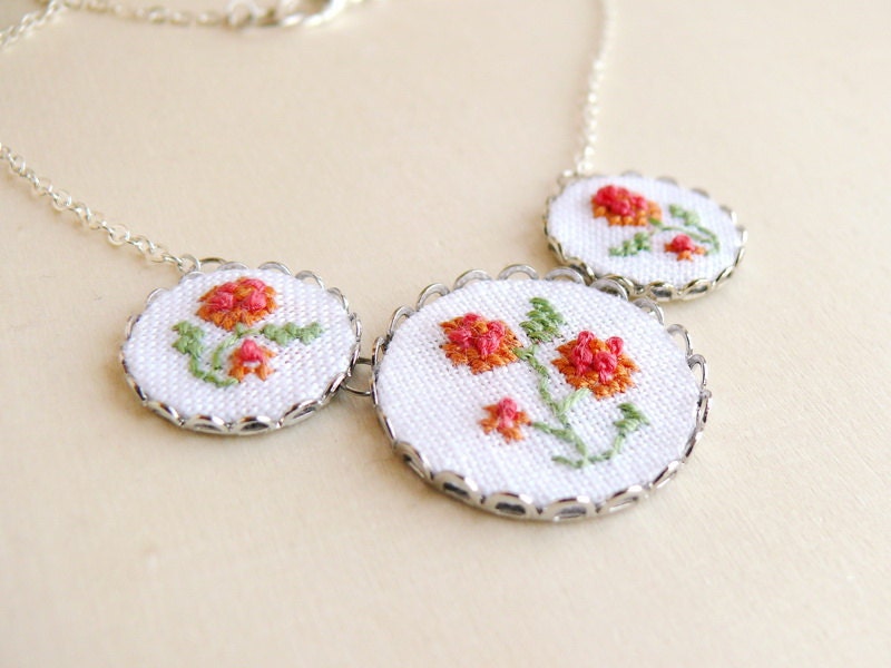 Embroidered floral necklace with silver toned findings