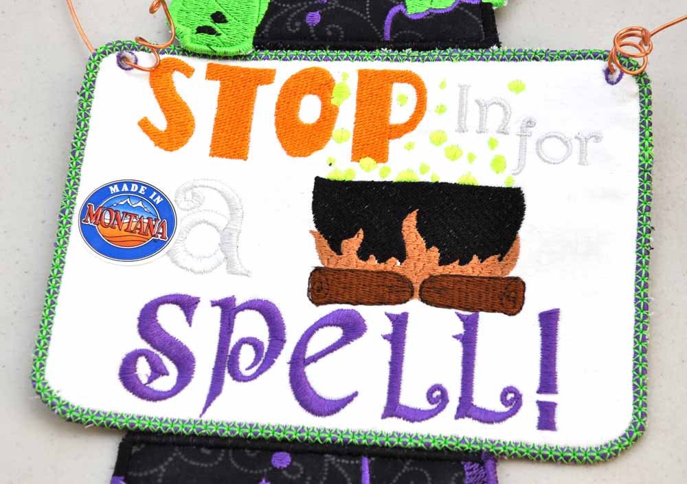 Halloween Decor Witch with sign Stop in for a Spell