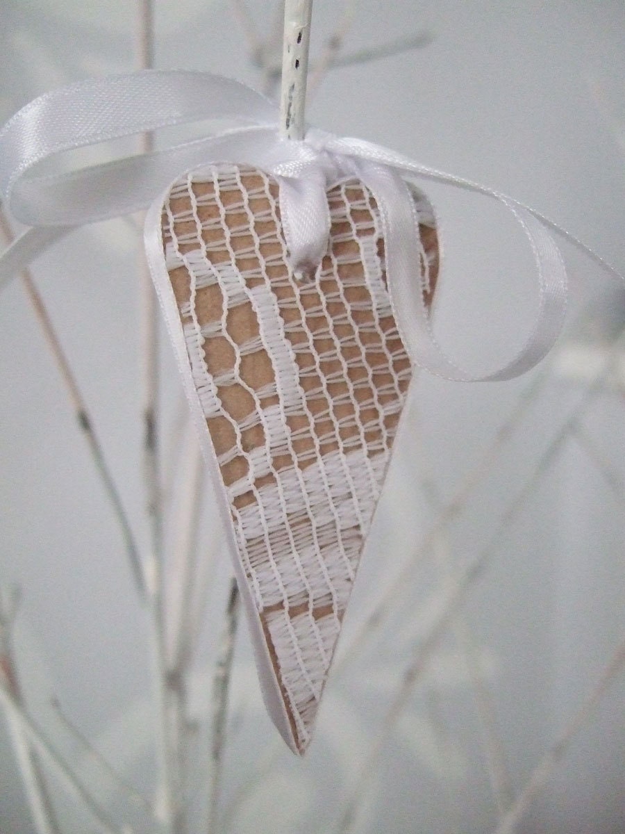 Decoration - snowy white lace on little birch wood heart