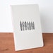 white journal: calligraphy pens