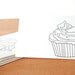 white envelopes set of five: black cupcake