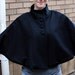 Fully lined black wool capelet