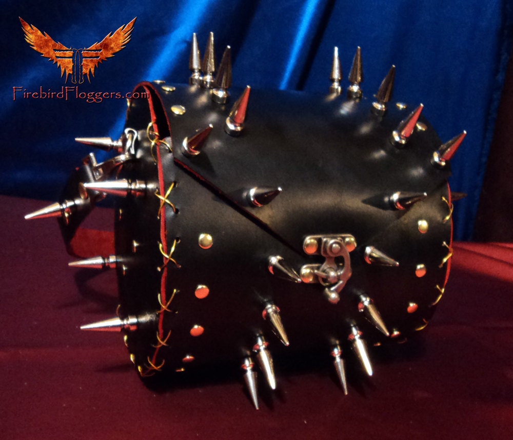 Black and red spiked handbag