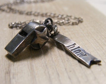 whistle necklace, sterling silver with stamped tag blow