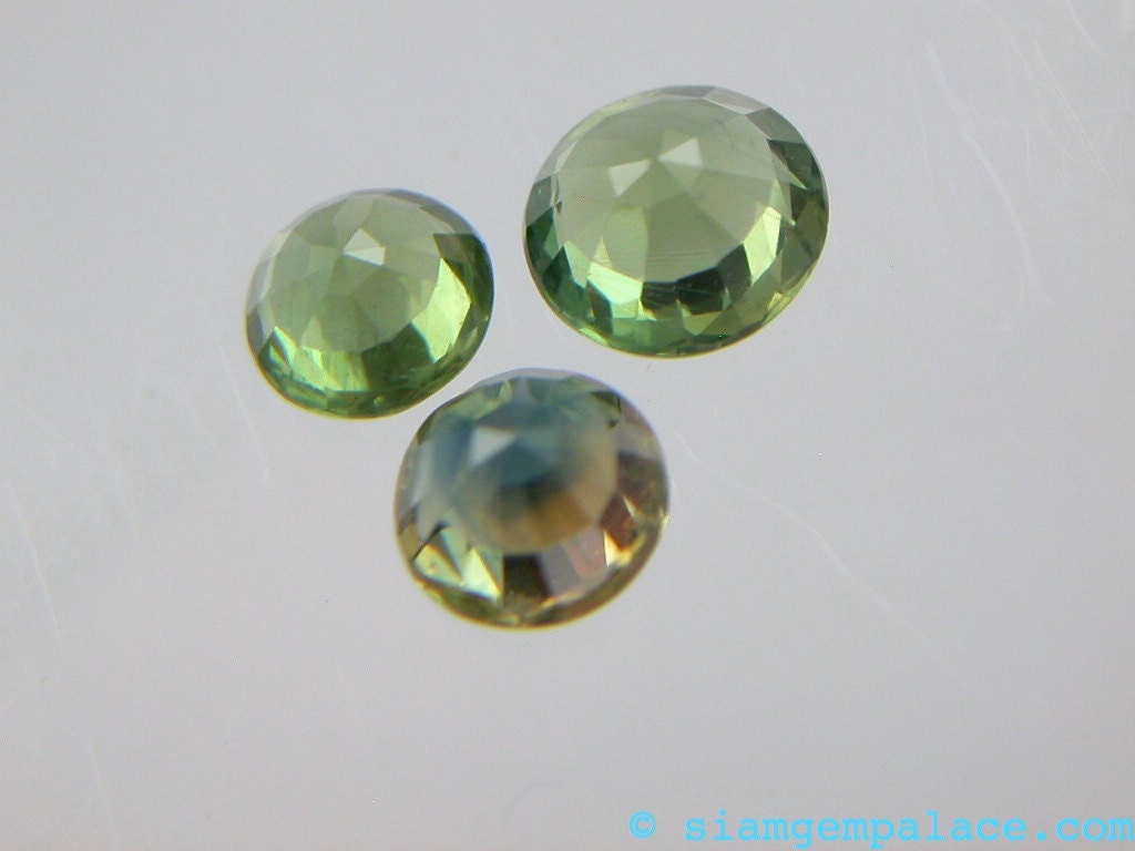 SAPPHIRE. Natural. Green. Round. 3pc. 2.15 cts. 4.5, 5, 5.5mm (S396)