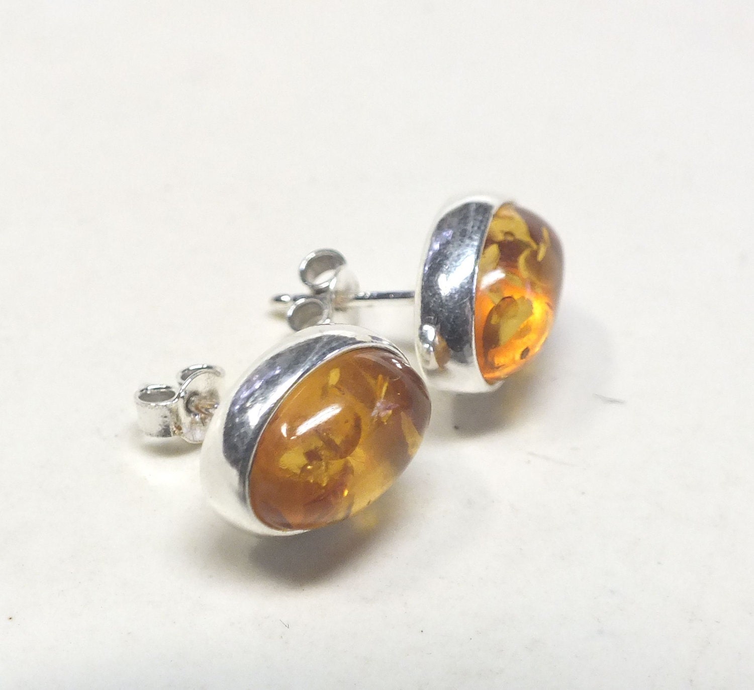 Oval Amber and Sterling Silver Posts