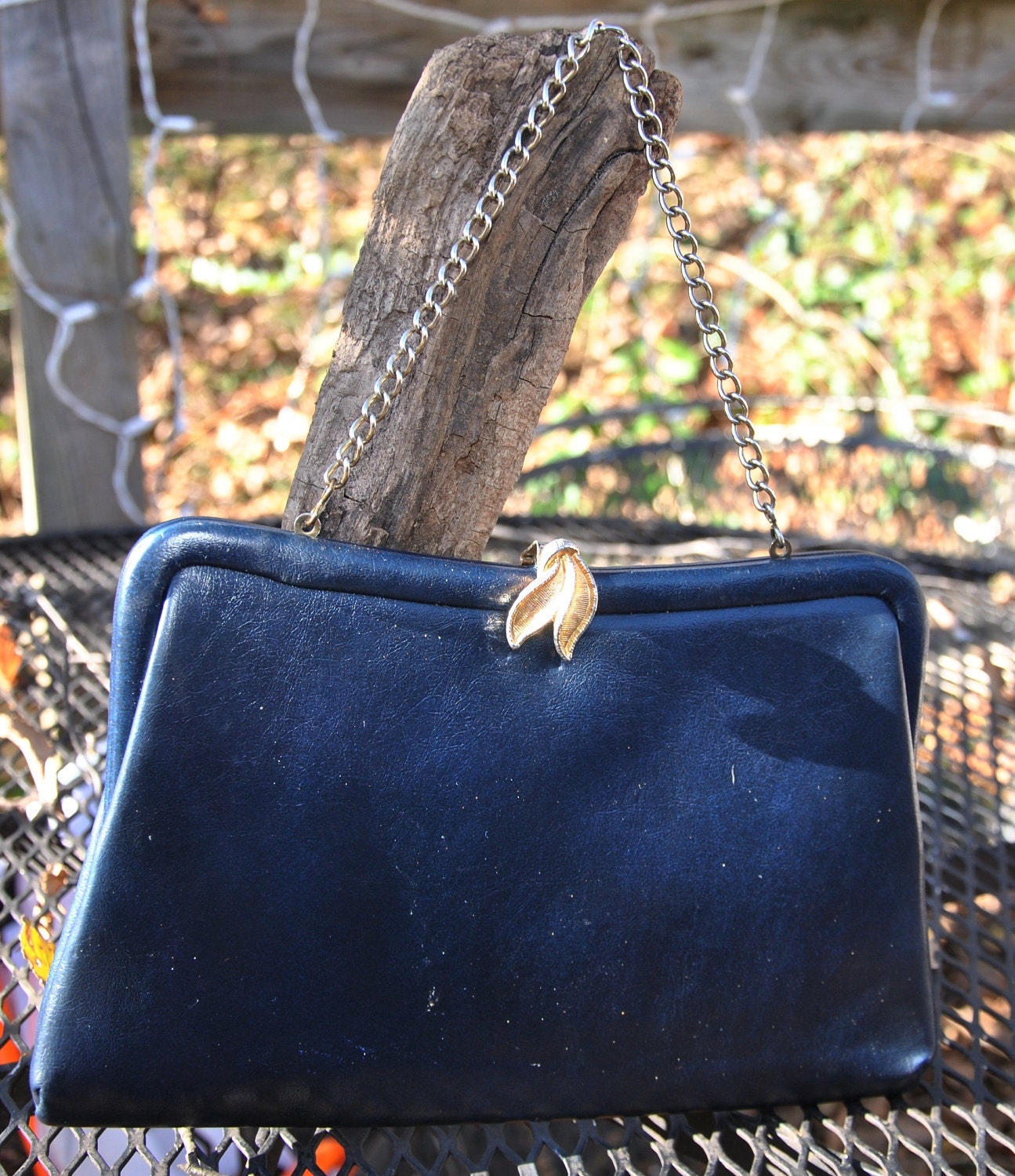 navy blue and white clutch bag