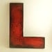 Wooden letters made from reclaimed plywood, letter L