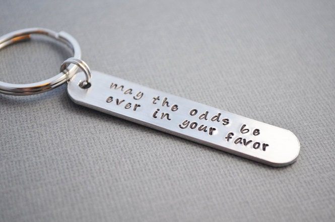 Hunger Games May the odds be EVER in your favor keychain hand stamped by TheCopperFox