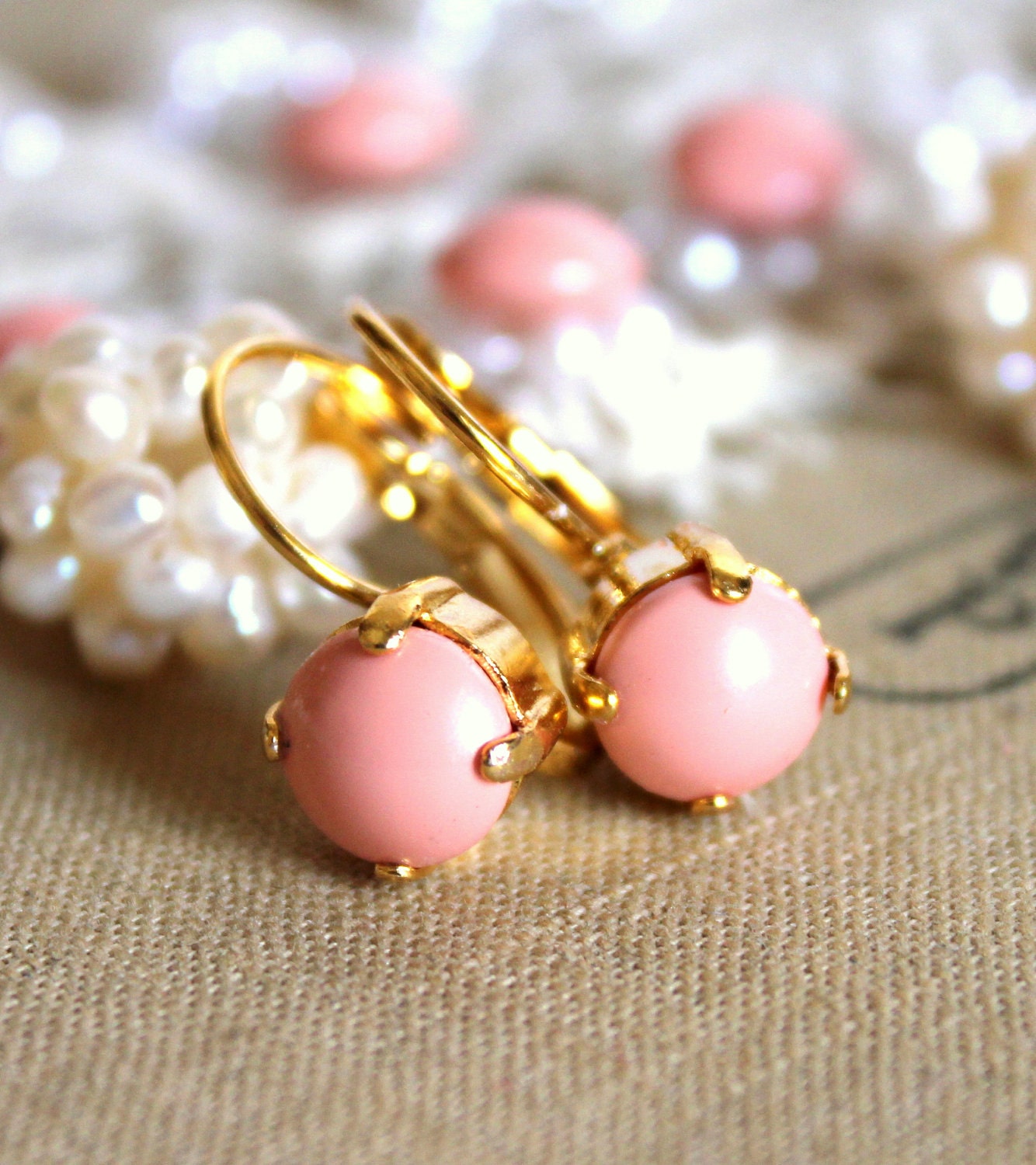 Pink and gold earrings - 14k gold plated earrings with real pink swarovski pearls .