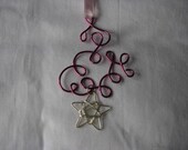 Dark pink, fuchsia ornament or suncatcher
