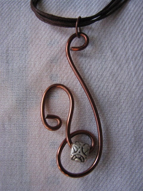 Brown wire pendant.