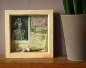 The Well Travelled Miss Phyllis Dare box frame fabric collage