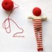 red striped doll - bonhomme