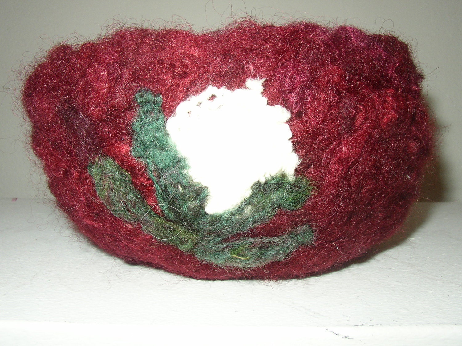 Christmas cactus, a burgundy needle felted bowl