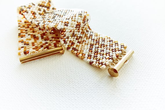 Leopard. Safari style delica beadwork cuff/ bracelet.  African earth toned trended jewelry.