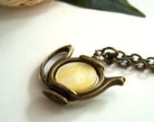 the little teapot necklace.