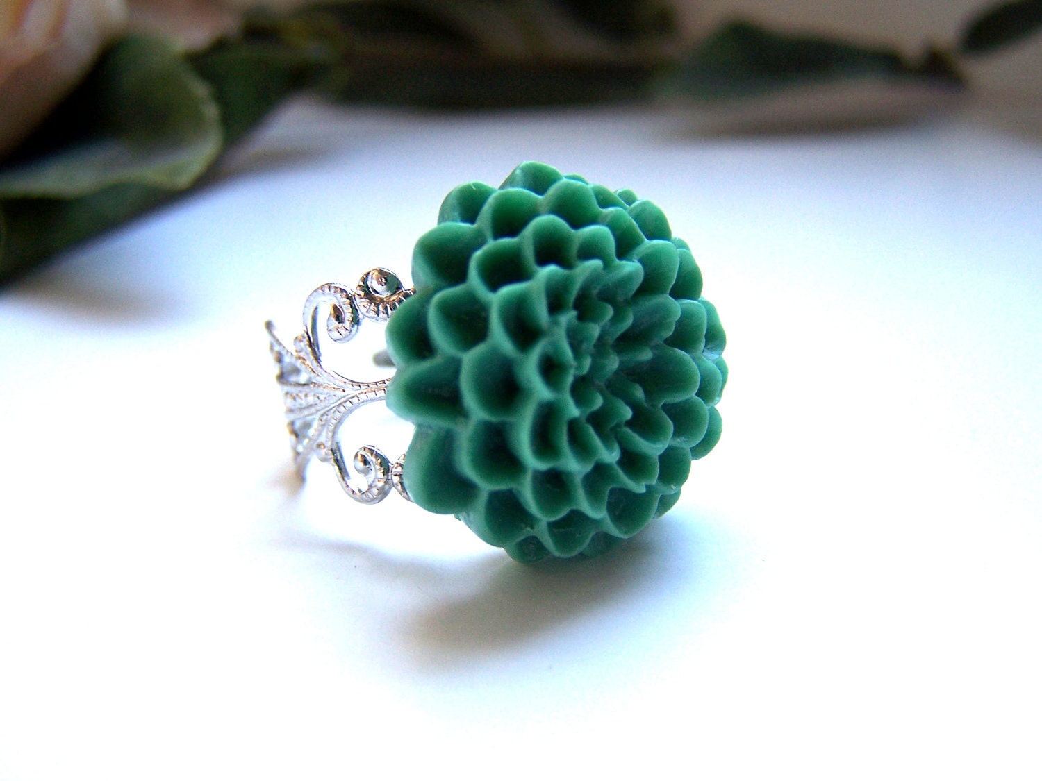 the teal sara ring.