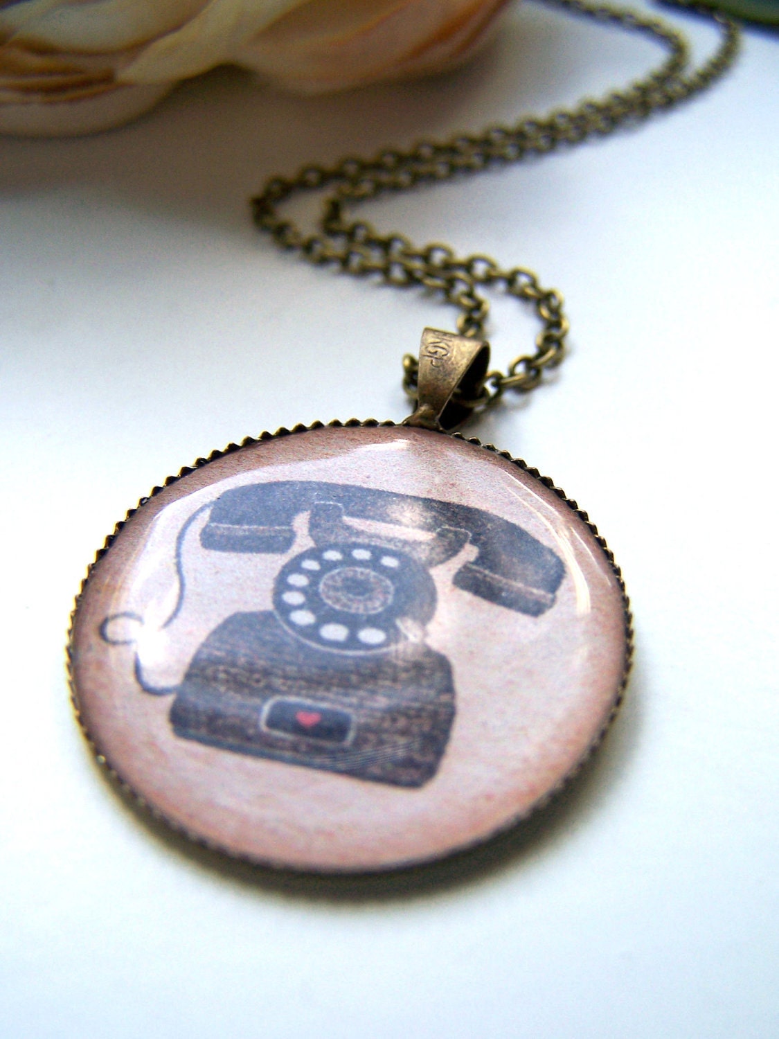 the vintage telephone pendant necklace.