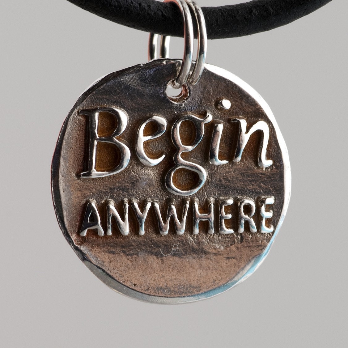 Begin anywhere... (093)  Inspirational quote Silver pendant