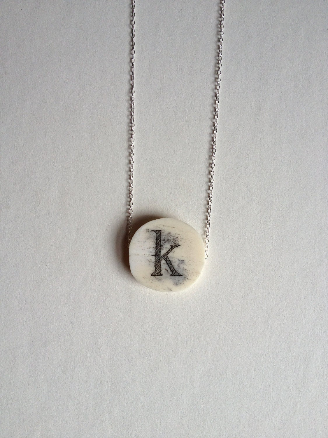 monogram scrimshaw necklace: K