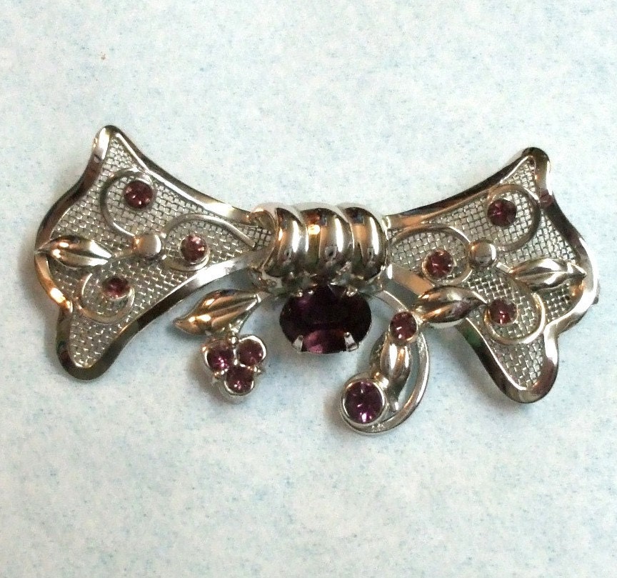 Vintage Sterling Silver Bond Boyd Bow Pin with Purple Rhinestones
