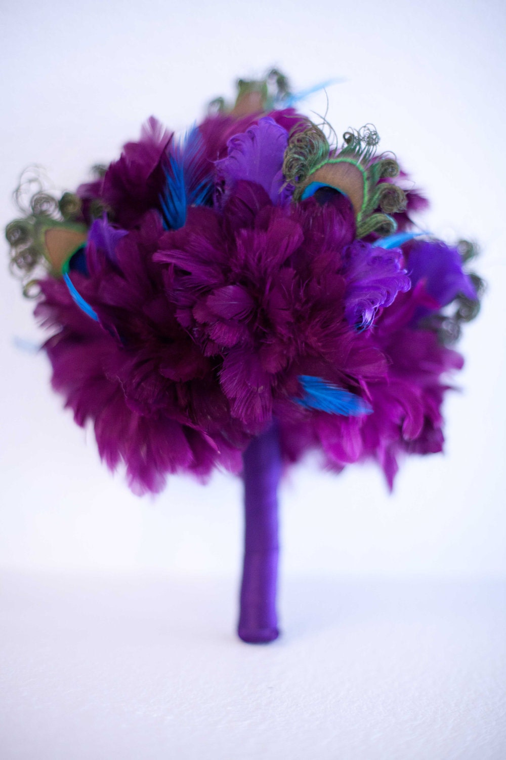 Purple and Peacock Feather Bridesmaid Bouquet with Blue Accents