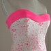 Hot pink strapless sweetheart neckline music note fit n flare swing dress