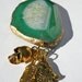 Chunky gold chain link necklace with green agate & gold charms