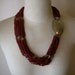 vintage seed bead necklace. ethnic bohemian tribal multi strand large hammered silver disc.
