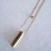 Drie - vintage brass geometric tube and brass bead double necklace